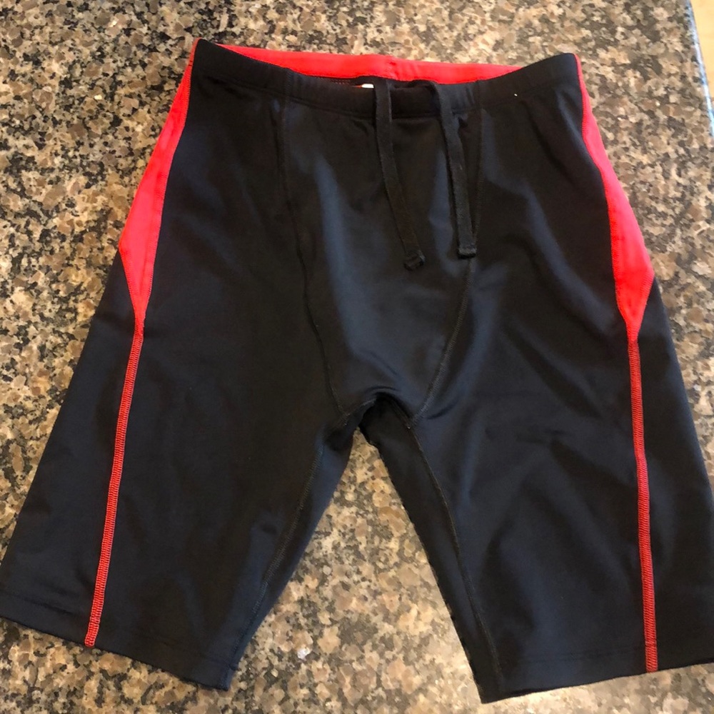 Boys swim jammers, black and red. Worn once.